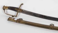 Light Cavalry saber. Brass mounting with a branch. Rectangular mounts. Fusée ebony squared. Blade with two hollow sides engraved and blued with gilding. 