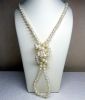 Long necklace made of natural cultured pearls (D: 7 - 7,5 mm), length 1,20 meter (one knot between each pearl)