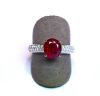 White gold ring centered on a natural oval Burmese ruby with a beautiful luminous red colour weighing 2.50 c, set with 44 round brilliant-cut diamonds G/VS - Gold 3.72 g. 