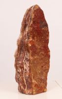 Stele in red mineral stone