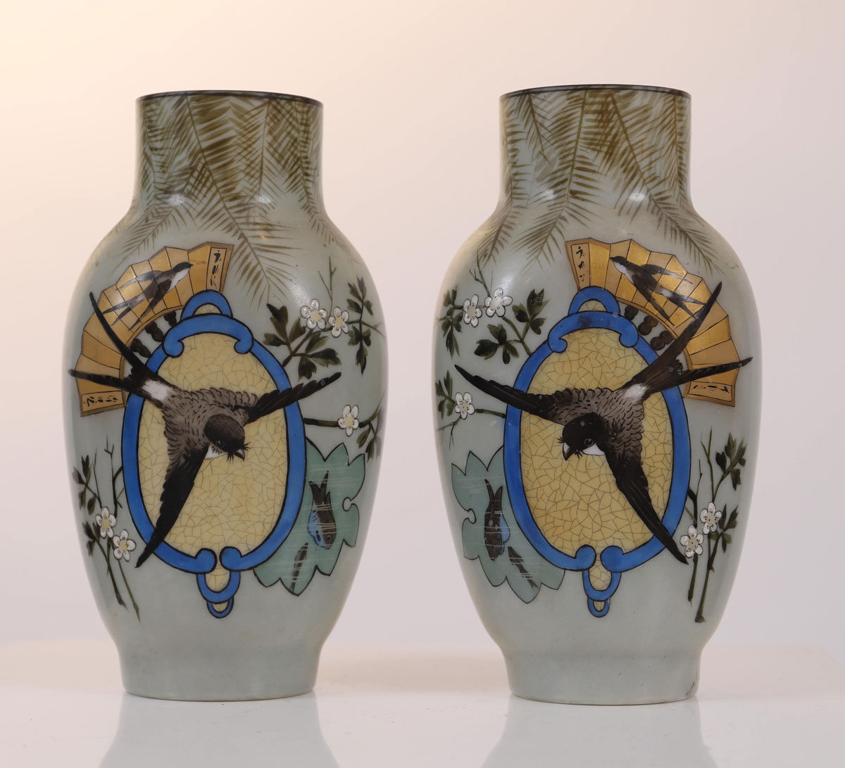 Pair of vases with birds