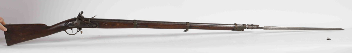 Flintlock type rifle with bayonet, probably foreign to the 