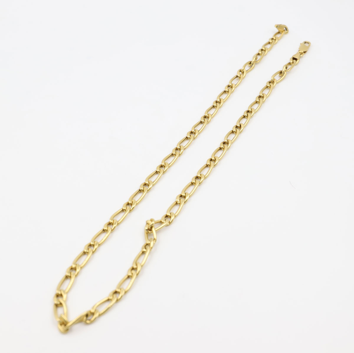 Figaro chain in 18K yellow gold