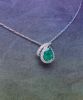 White gold pendant set with modern round diamonds G/VS for 0,80 c approx. supporting a natural drop emerald probably Colombia weighing 2,20 c approx. - Gold 6,12 g