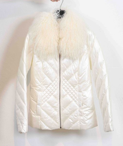 White parka with removable goat fur collar.